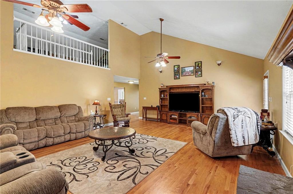 526 Antioch Church Road Talking Rock, GA 30175 - Photo 7 of 38 a living room with furniture and wooden floor