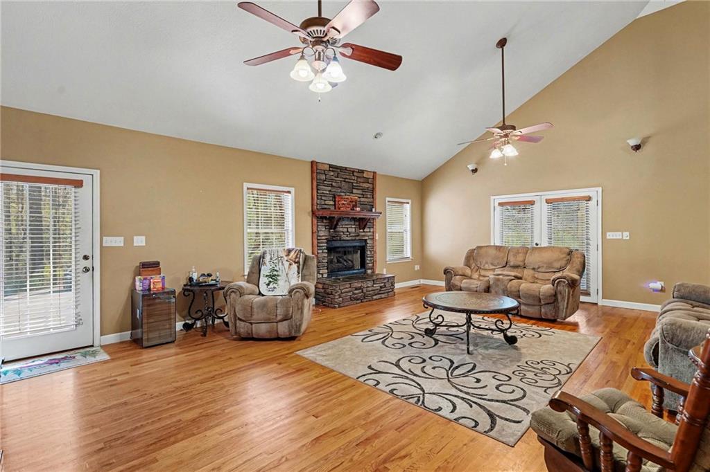 526 Antioch Church Road Talking Rock, GA 30175 - Photo 8 of 38 a living room with furniture and wooden floor