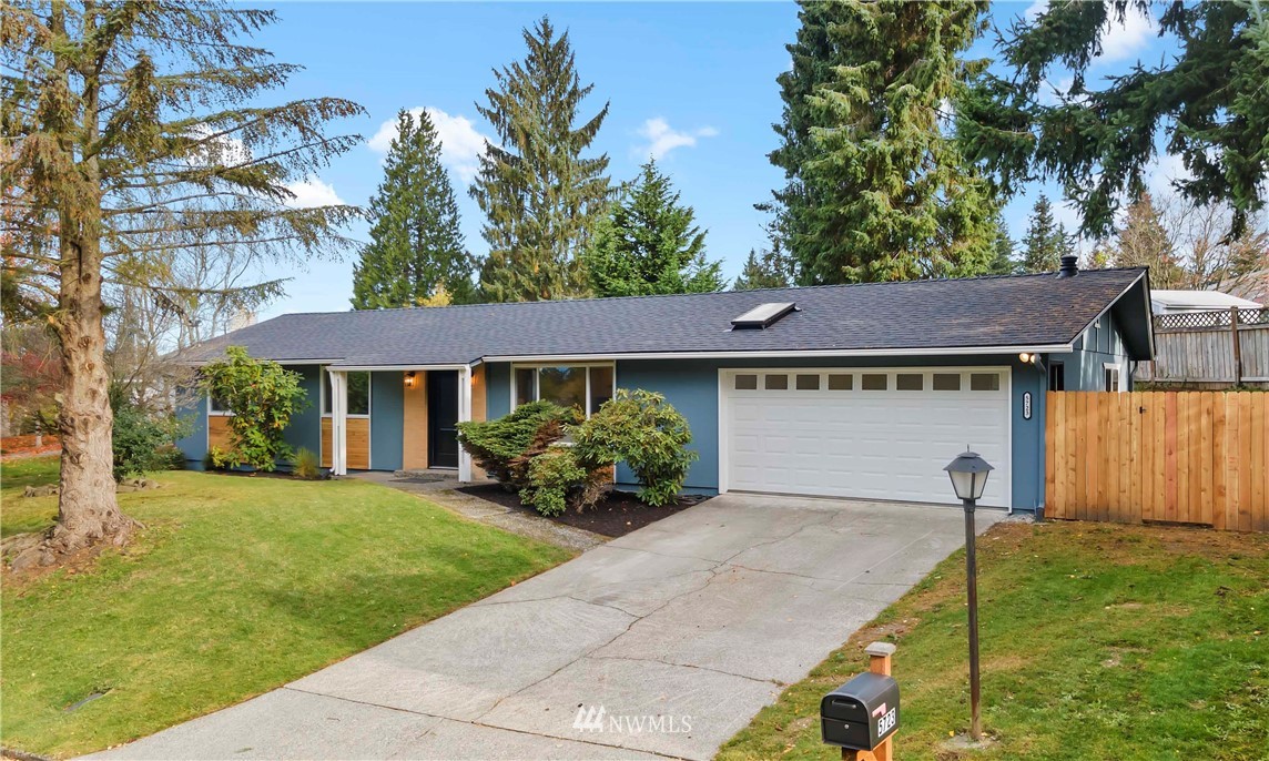 5723 Highland Road Everett, WA 98203 - Photo 1 of 21 a view of a house with garden and yard