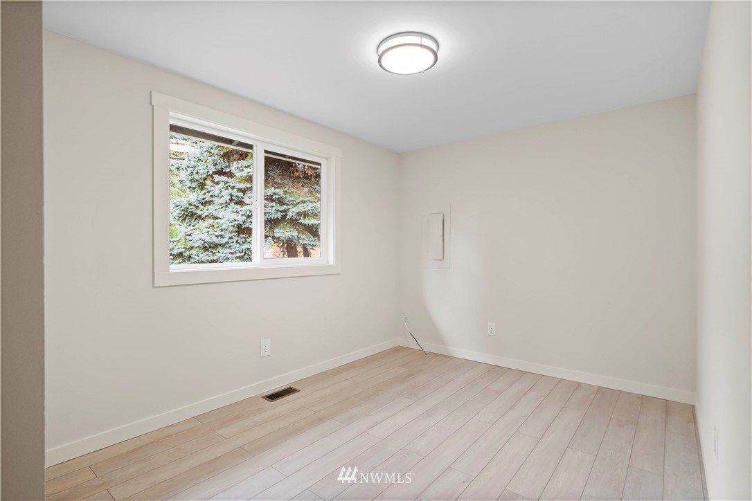 5723 Highland Road Everett, WA 98203 - Photo 16 of 21 an empty room with a window