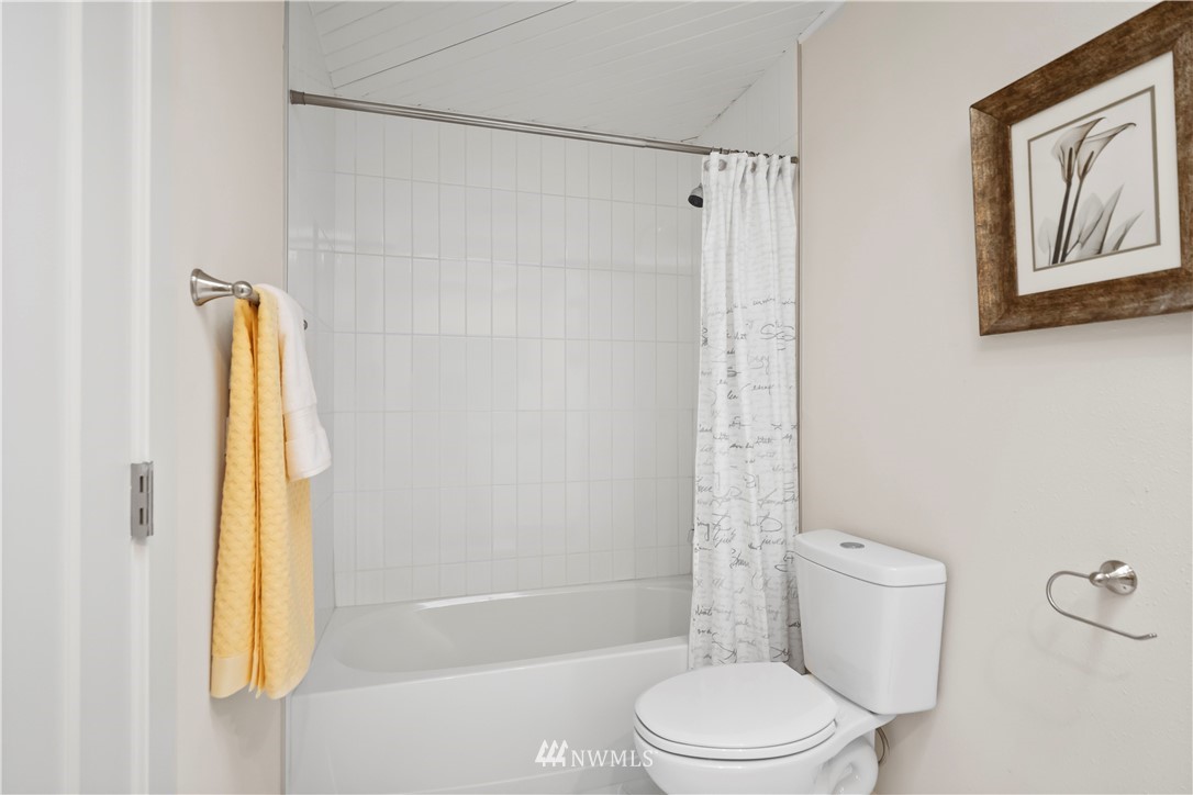 5723 Highland Road Everett, WA 98203 - Photo 17 of 21 a bathroom with a toilet and a shower