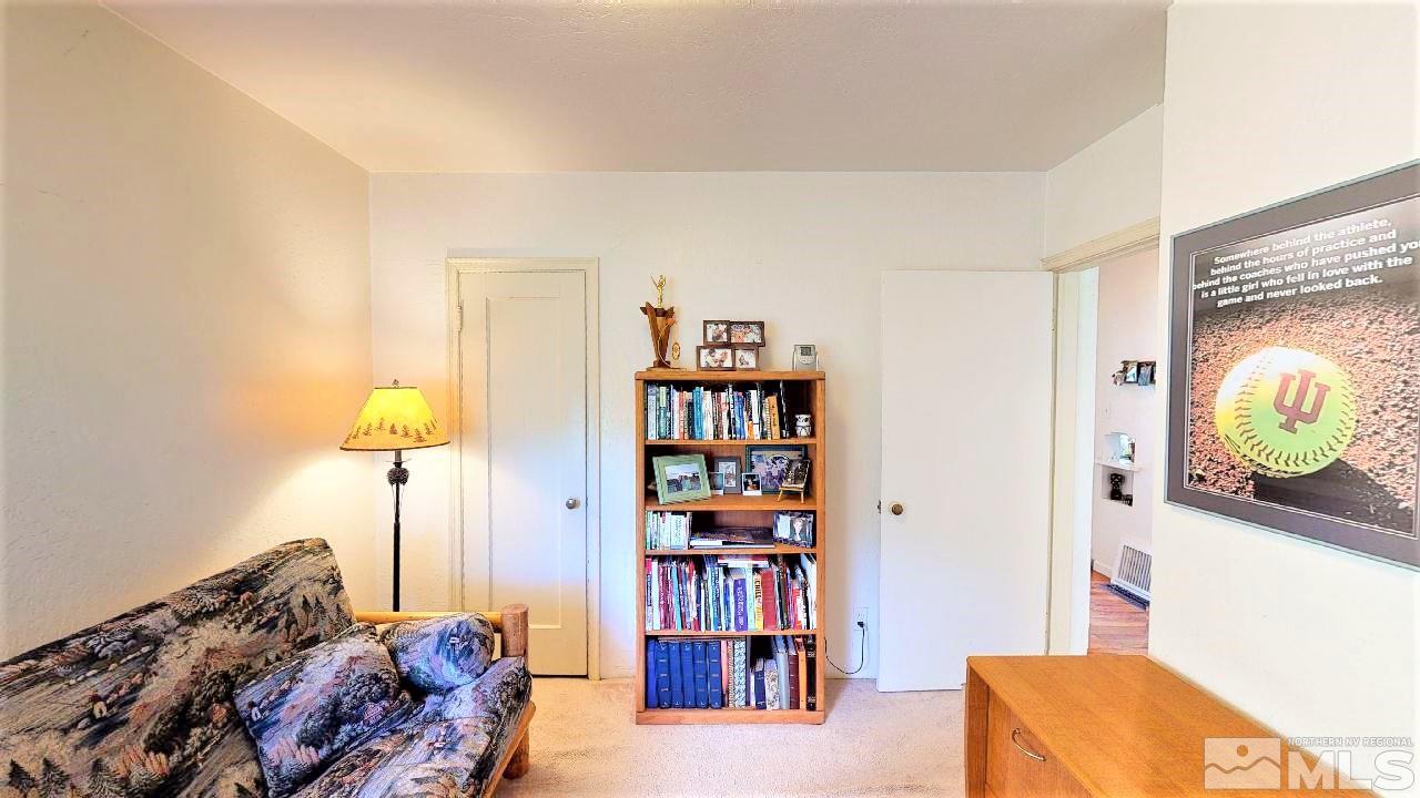 30 Kohlepp Avenue Reno, NV 89509 - Photo 22 of 29 a bedroom with a bed and a book shelf