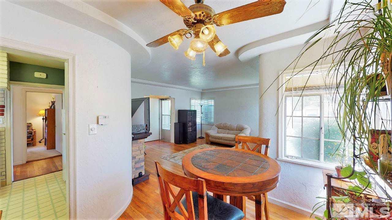 30 Kohlepp Avenue Reno, NV 89509 - Photo 9 of 29 a dining room with chandelier fan and wooden floor