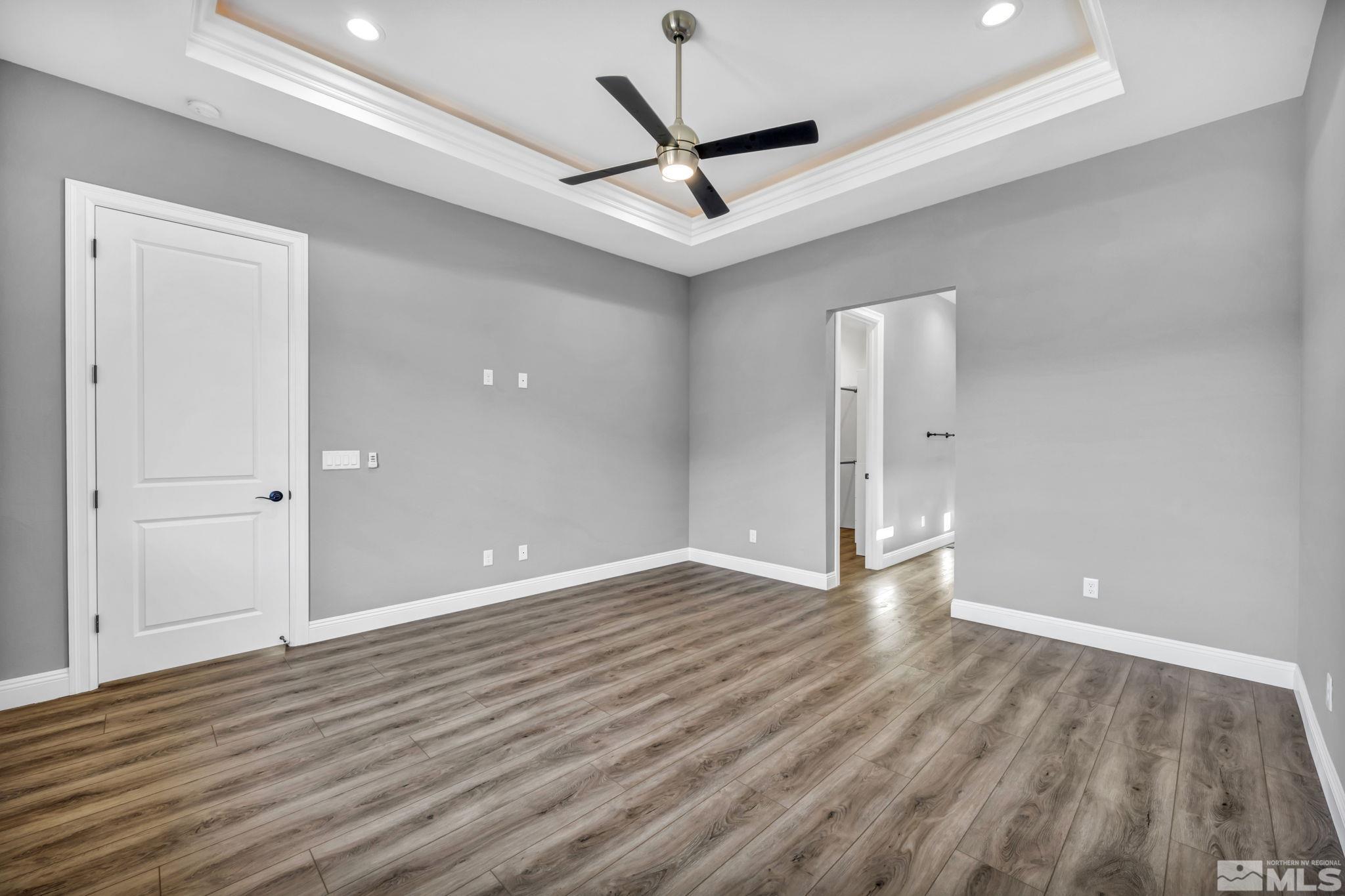 3108 Cambria Loop Carson City, NV 89703 - Photo 26 of 39 a view of an empty room and wooden floor