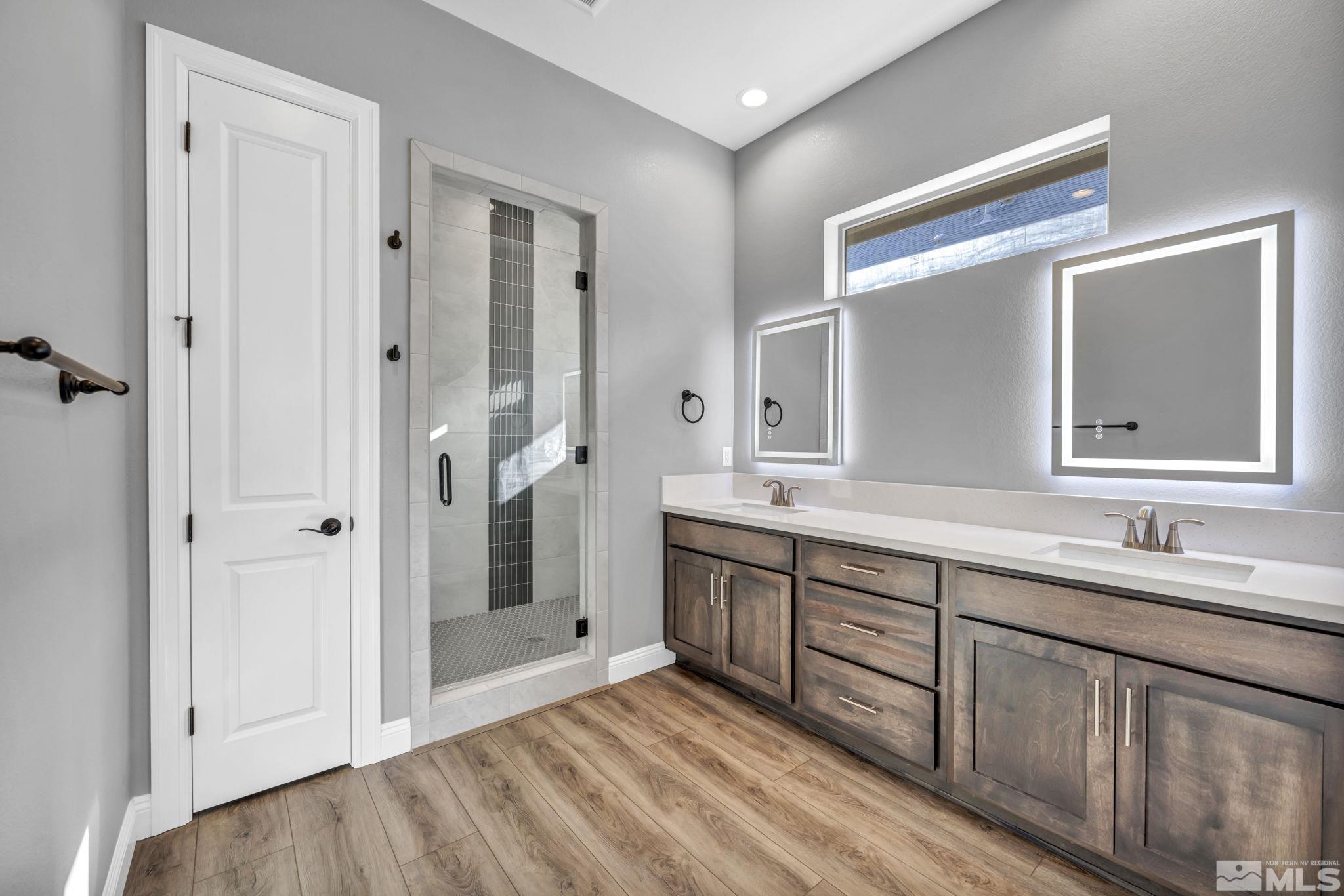 3108 Cambria Loop Carson City, NV 89703 - Photo 28 of 39 a spacious bathroom with 2 sink and a mirror