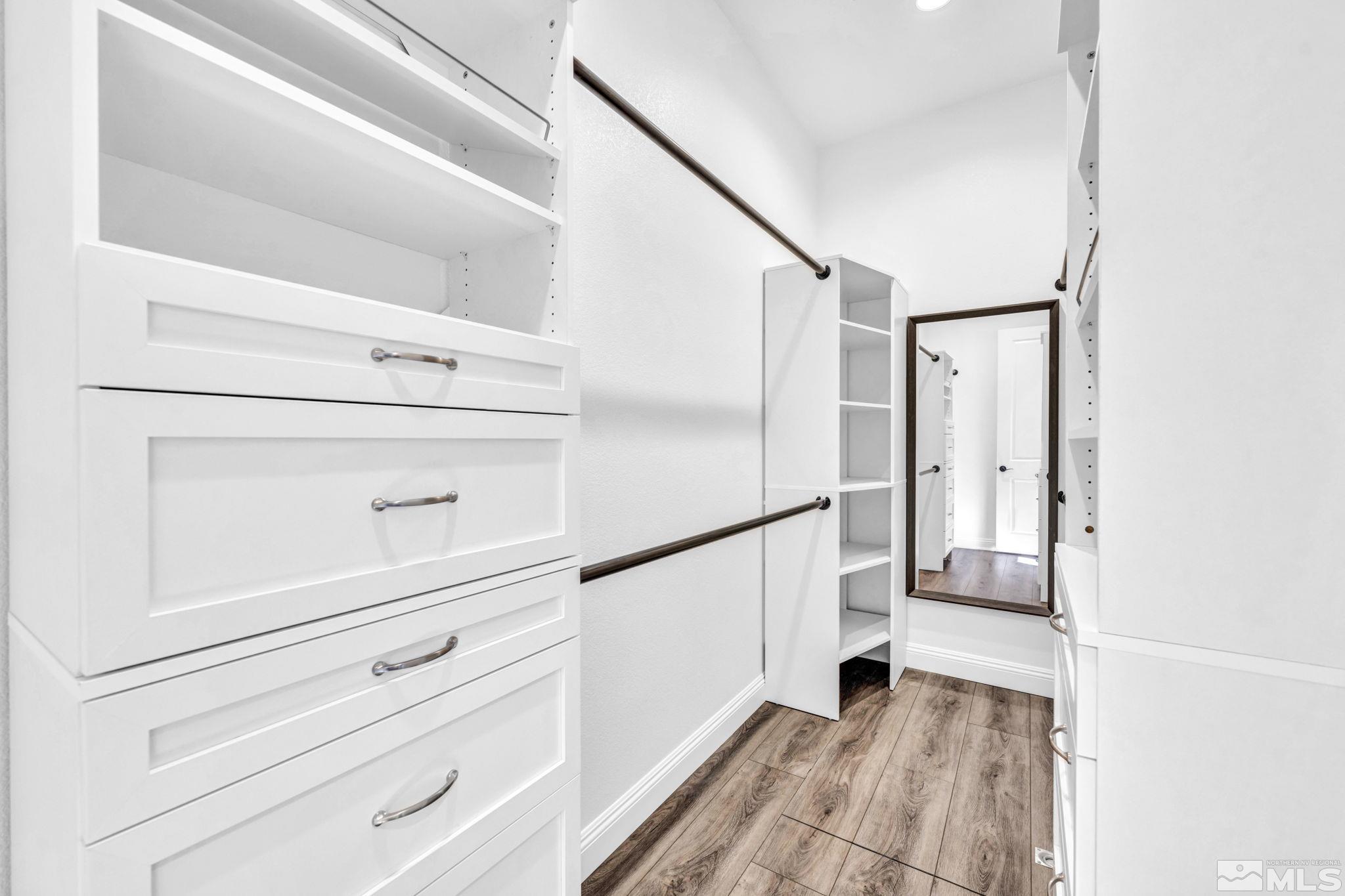 3108 Cambria Loop Carson City, NV 89703 - Photo 30 of 39 a view of walk in closet with empty racks