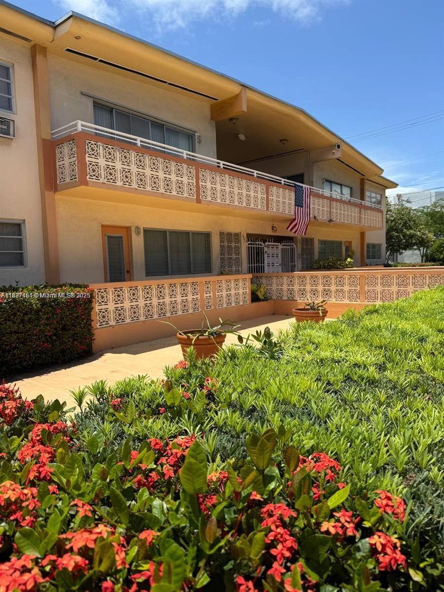 1060 Pennsylvania Avenue, Unit 18 Miami Beach, FL 33139 - Photo 1 of 21 a view of a house with a garden