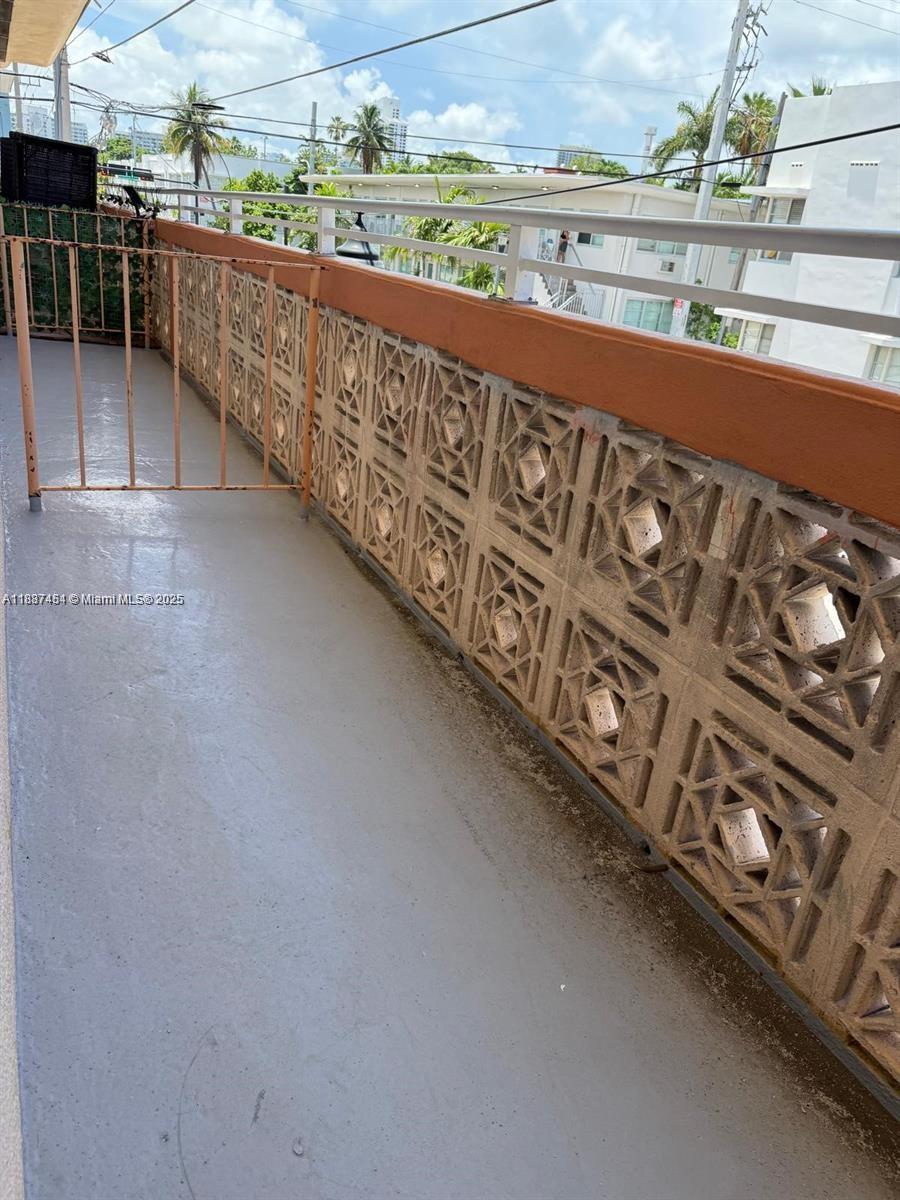 1060 Pennsylvania Avenue, Unit 18 Miami Beach, FL 33139 - Photo 16 of 21 a view of balcony with furniture