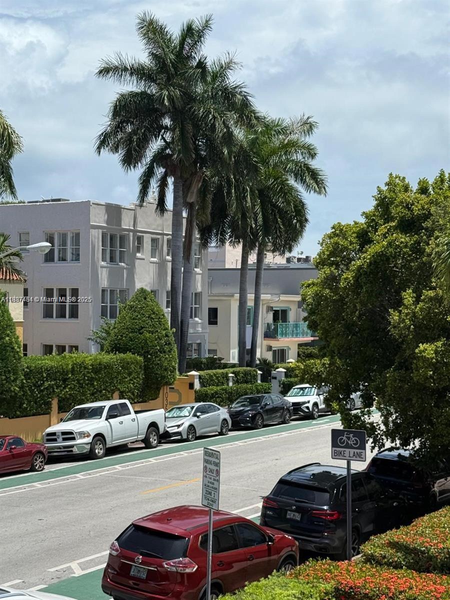 1060 Pennsylvania Avenue, Unit 18 Miami Beach, FL 33139 - Photo 20 of 21 a car parked in front of a houses