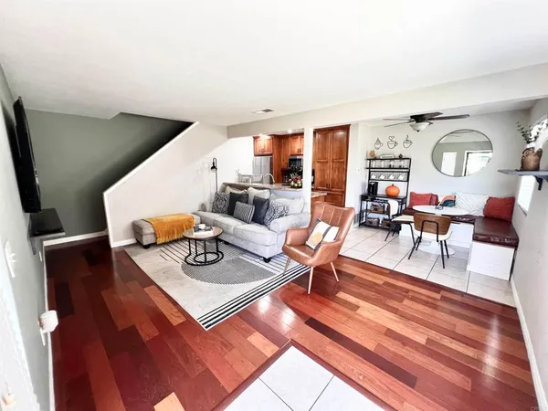 a living room with furniture and a table