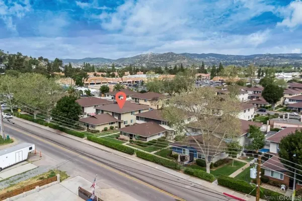 an aerial view of a city with lots of residential buildings
