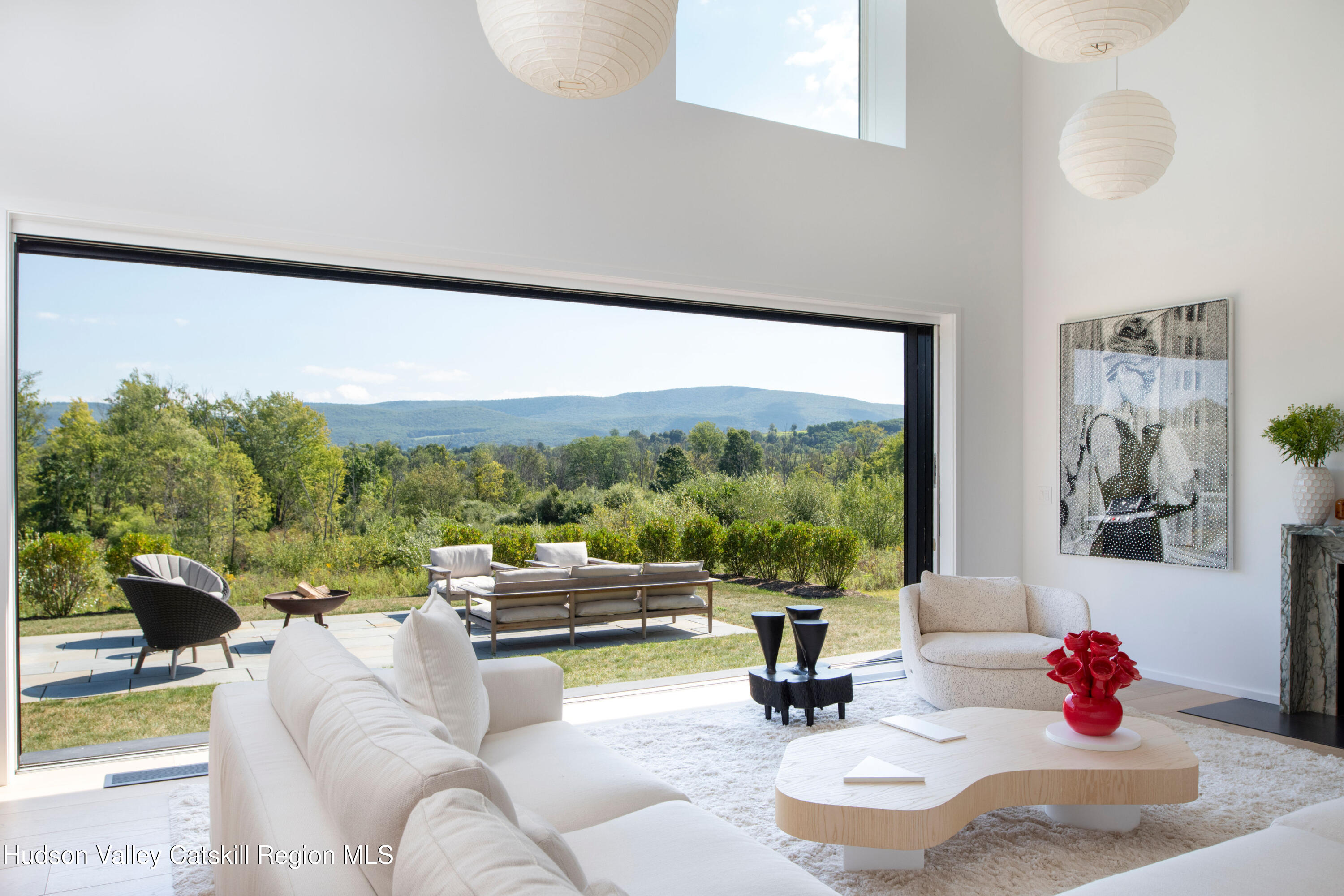 78 Waldorf Ridge Road Copake, NY 12516 - Photo 11 of 50 a living room with furniture and a large window
