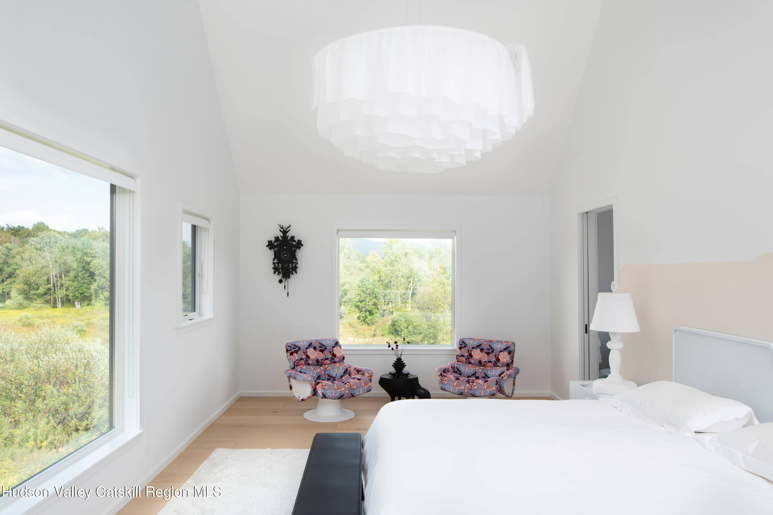 78 Waldorf Ridge Road Copake, NY 12516 - Photo 30 of 50 a bedroom with a bed and a large window