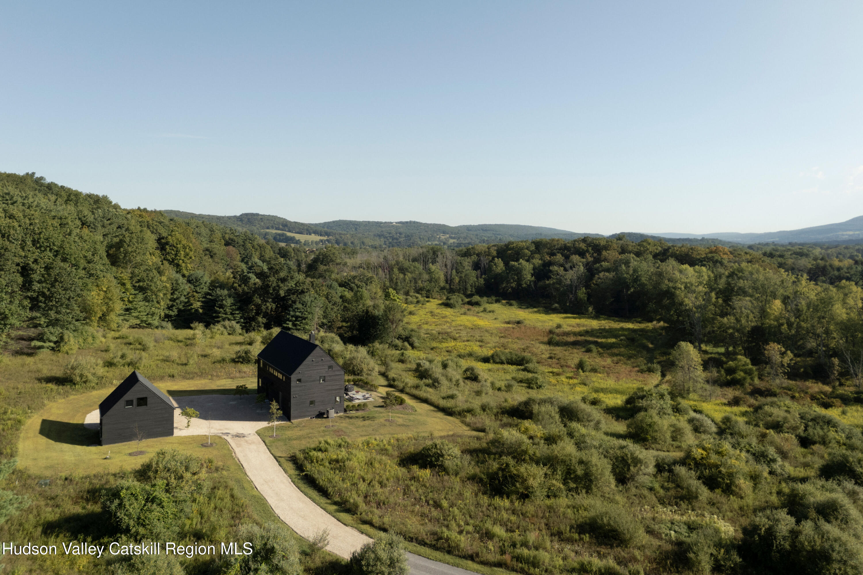 78 Waldorf Ridge Road Copake, NY 12516 - Photo 3 of 50 a view of a back yard from a balcony