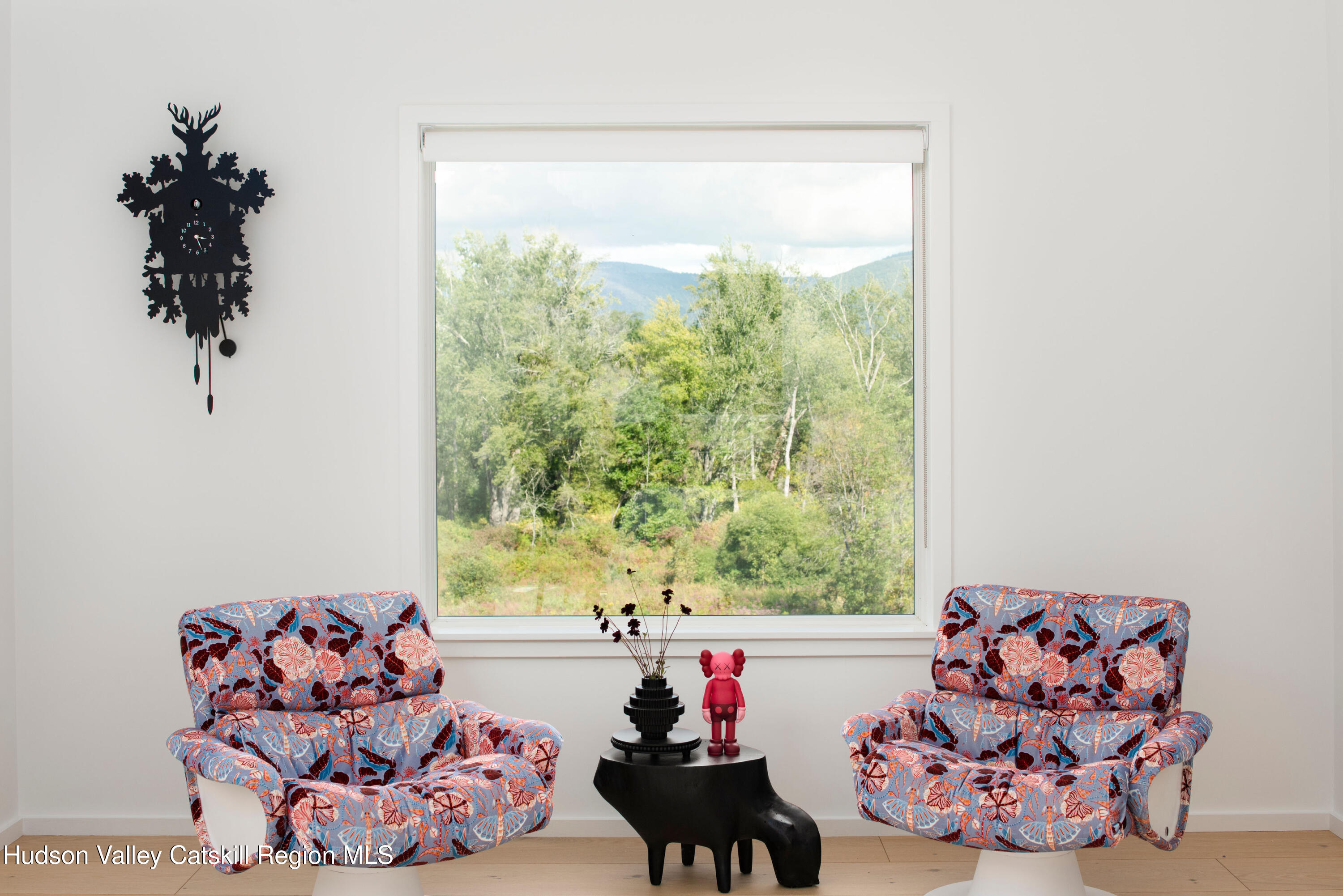78 Waldorf Ridge Road Copake, NY 12516 - Photo 31 of 50 a living room with furniture and a large window