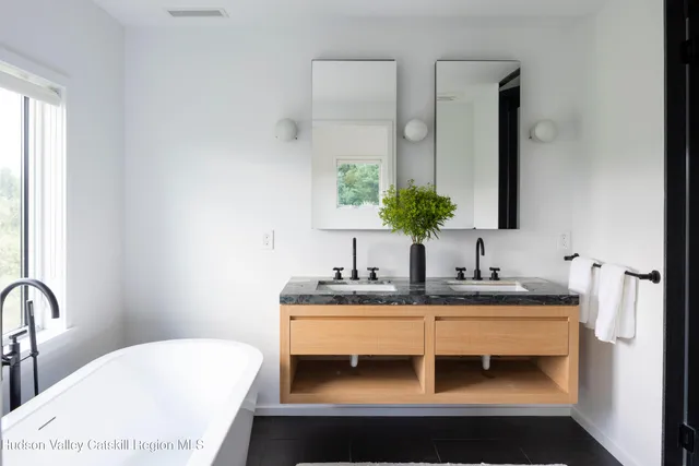 a view of a bathroom with shower