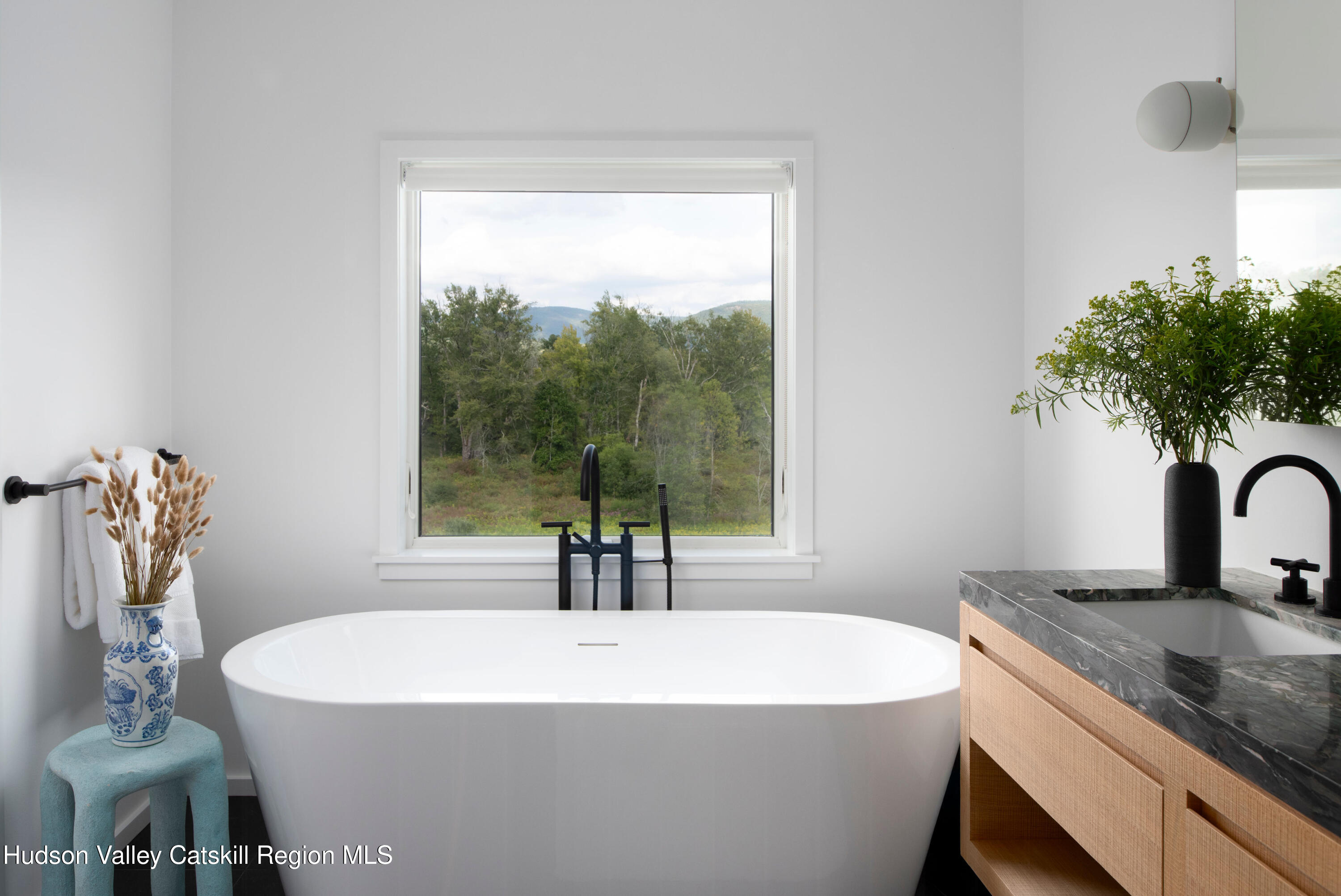 78 Waldorf Ridge Road Copake, NY 12516 - Photo 34 of 50 a white bath tub sitting in a bathroom