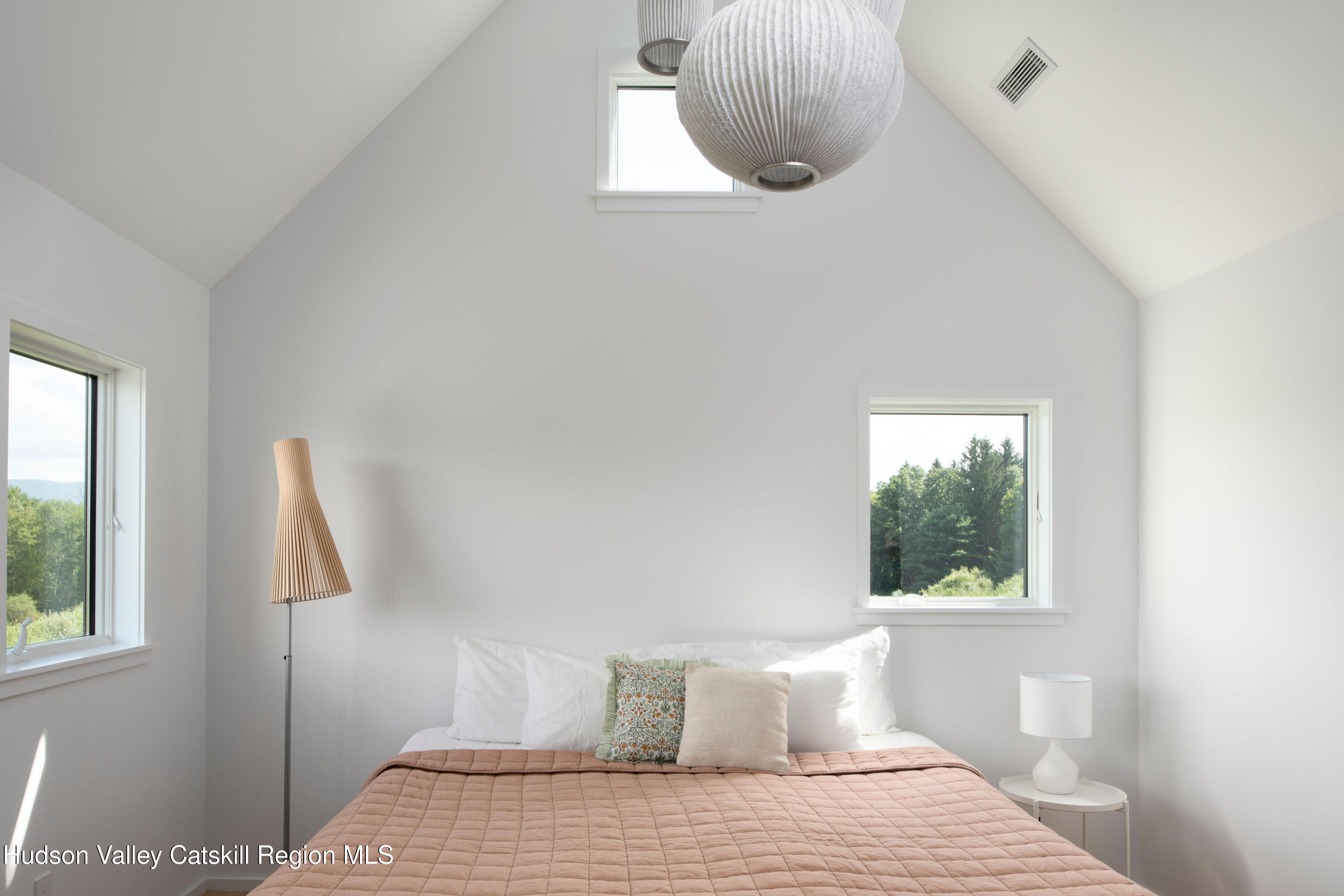 78 Waldorf Ridge Road Copake, NY 12516 - Photo 36 of 50 a bedroom with a bed and window