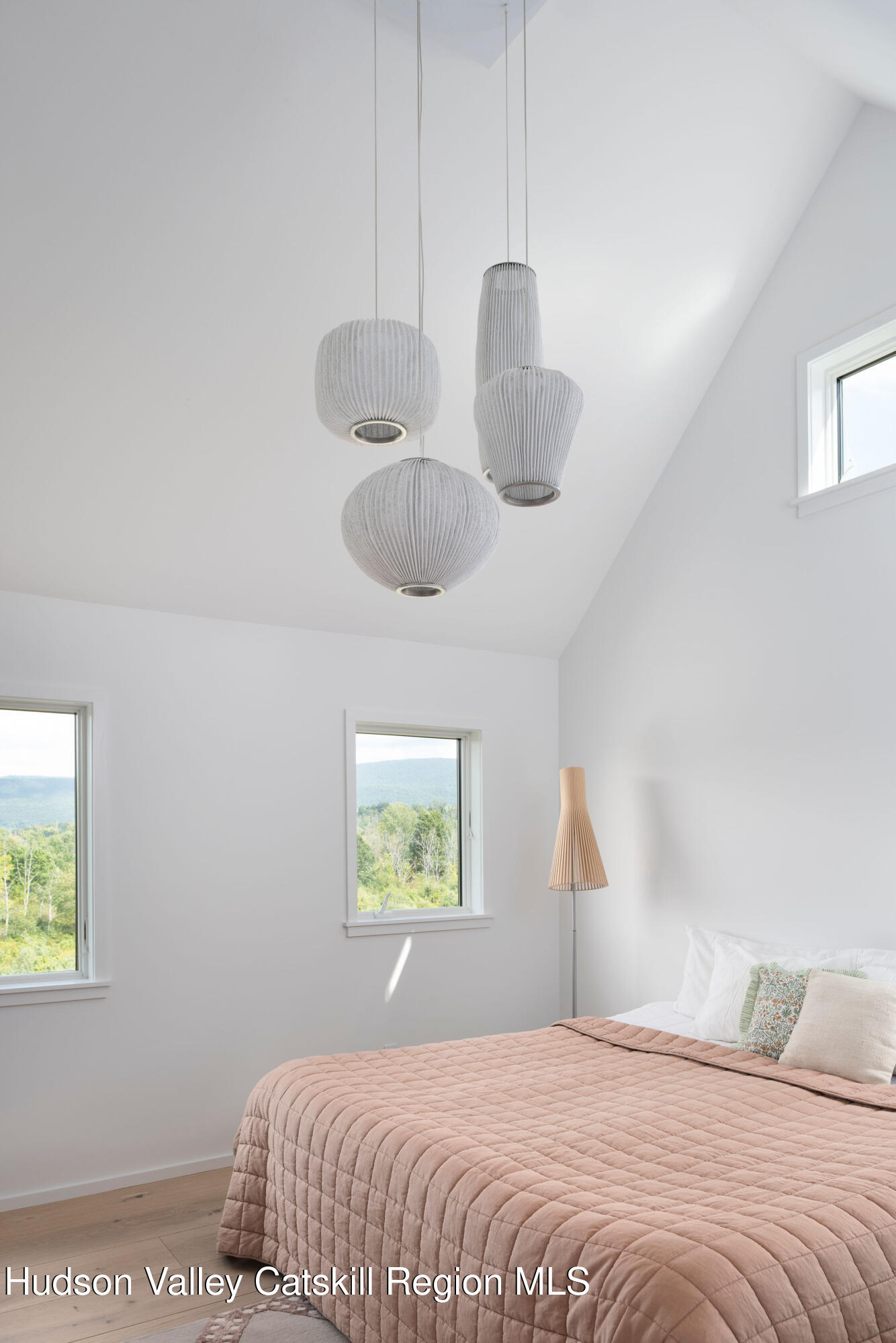 78 Waldorf Ridge Road Copake, NY 12516 - Photo 37 of 50 a bedroom with a bed and a painting on the wall