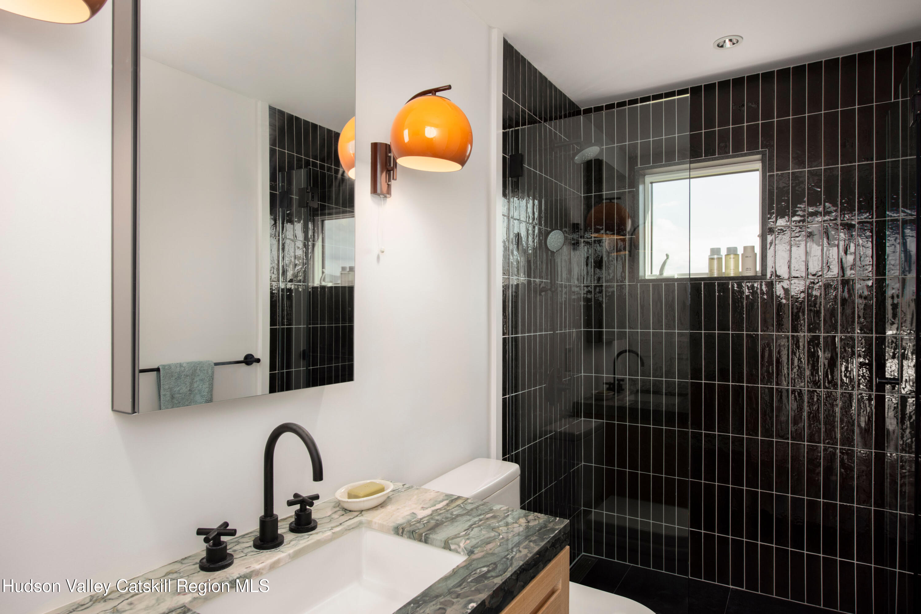 78 Waldorf Ridge Road Copake, NY 12516 - Photo 38 of 50 a bathroom with a sink and mirror