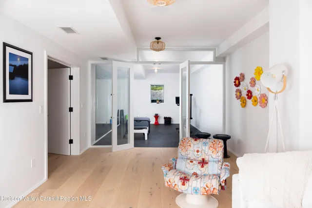 a room with gym equipment and a window