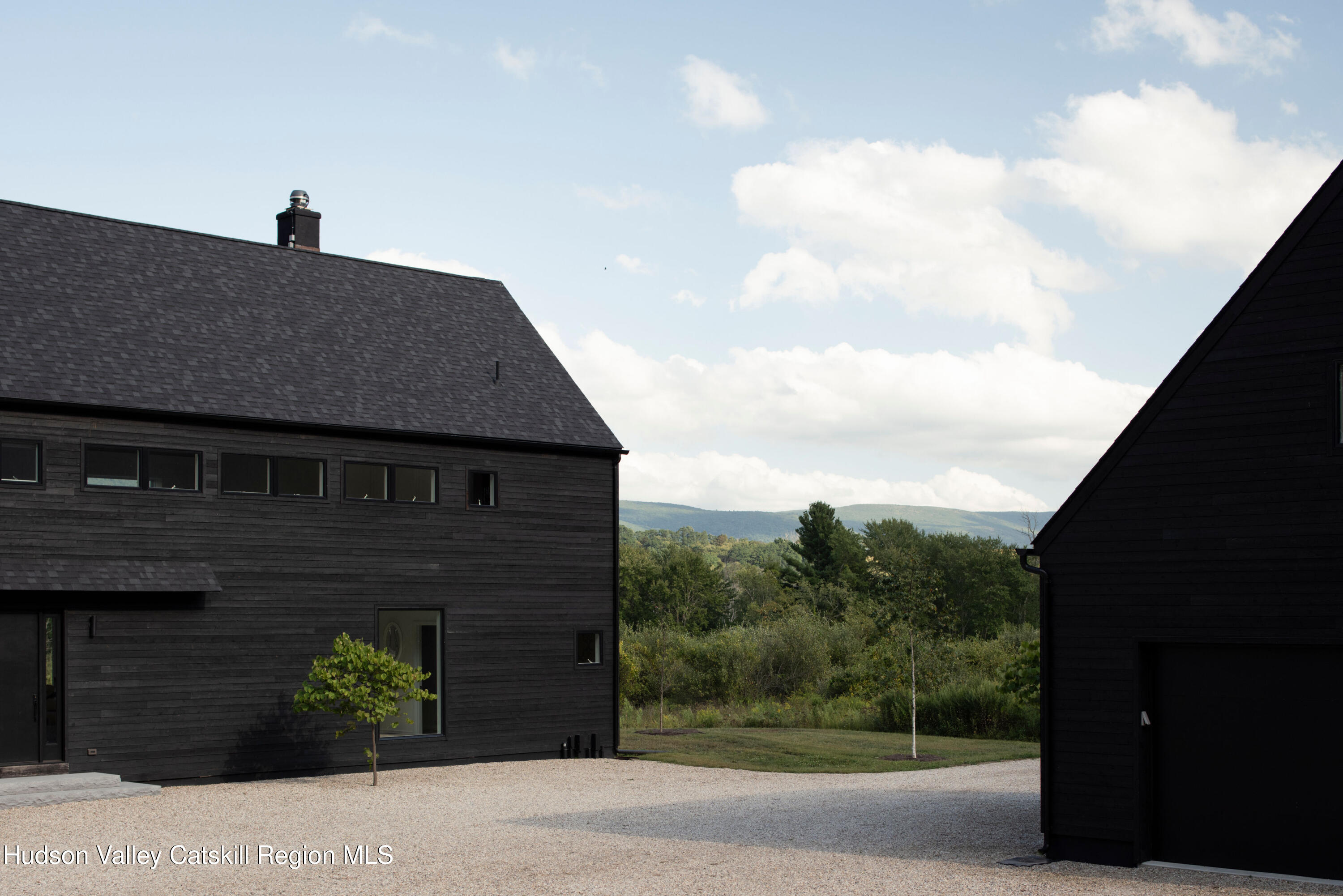 78 Waldorf Ridge Road Copake, NY 12516 - Photo 46 of 50 a front view of a house with a yard