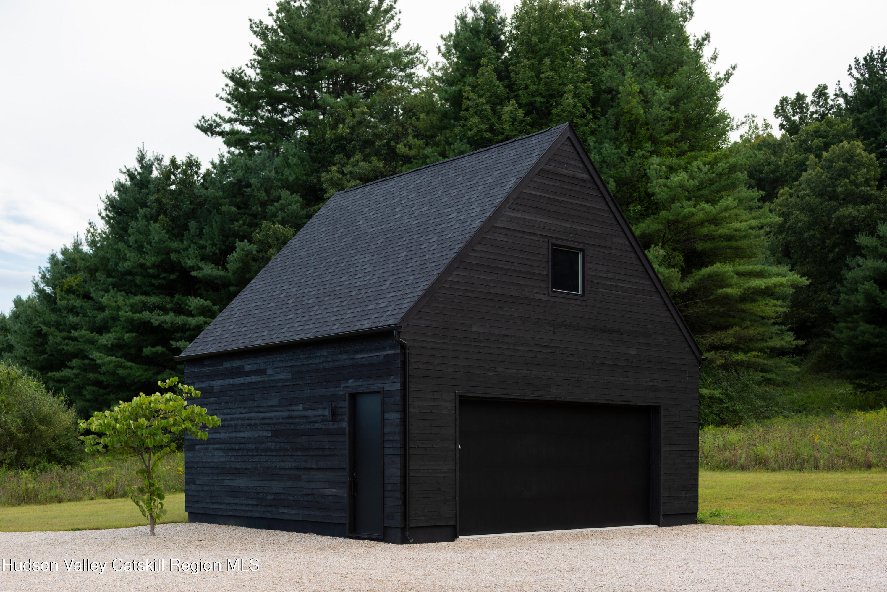 78 Waldorf Ridge Road Copake, NY 12516 - Photo 47 of 50 a backyard of a house with lots of green space