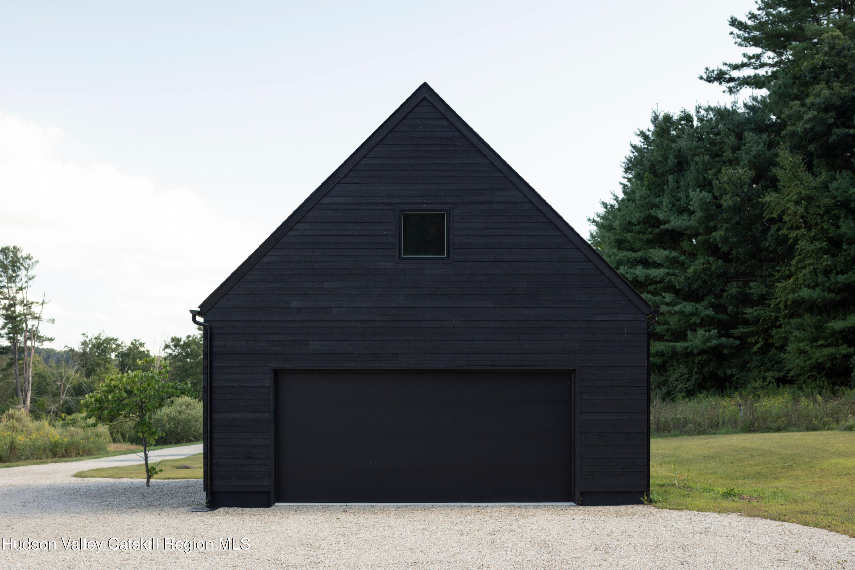 78 Waldorf Ridge Road Copake, NY 12516 - Photo 48 of 50 a backyard of a house with lots of green space