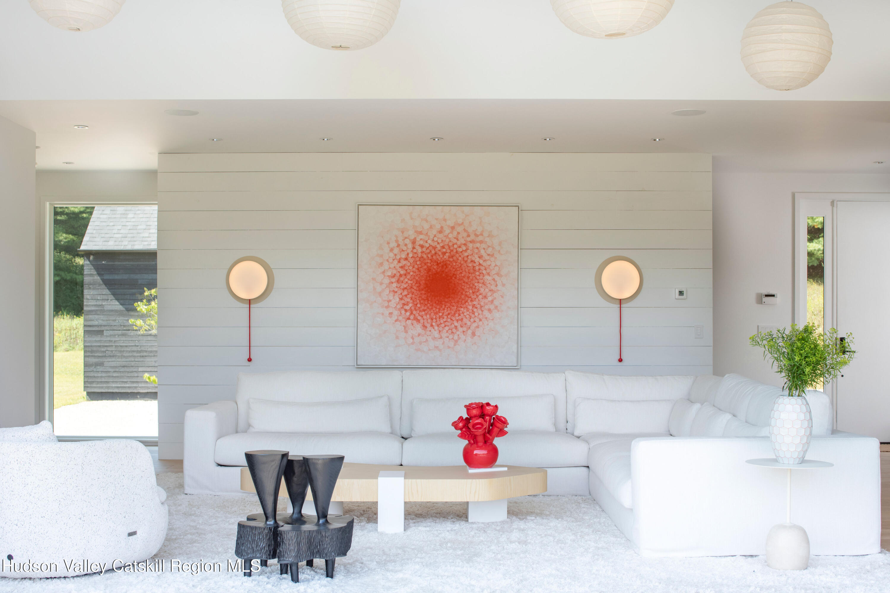 78 Waldorf Ridge Road Copake, NY 12516 - Photo 8 of 50 a living room with a sink and a potted plant