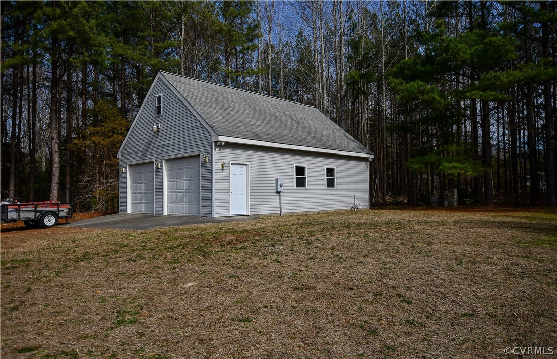 204 Hazelwood Road Aylett, VA 23009 - Photo 3 of 18 Oversized 2 car garage with unfinished storage upstairs