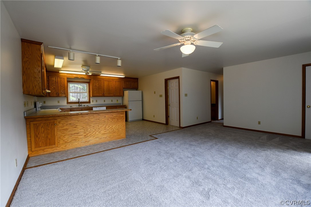 204 Hazelwood Road Aylett, VA 23009 - Photo 7 of 18 Living room open to kitchen