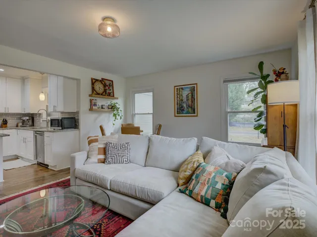 a living room with furniture and a couch