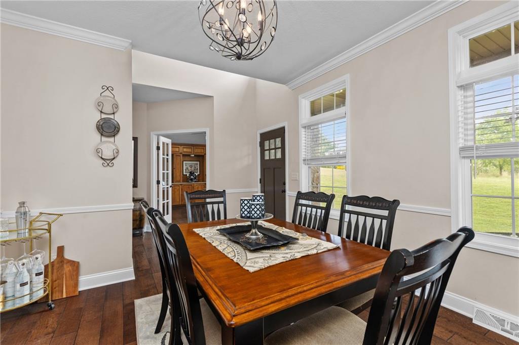 158 Hammond Road Mars, PA 16046 - Photo 11 of 49 a view of a dining room with furniture and wooden floor