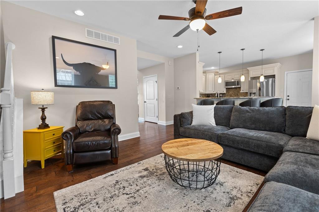 158 Hammond Road Mars, PA 16046 - Photo 13 of 49 a living room with furniture a rug and a chandelier