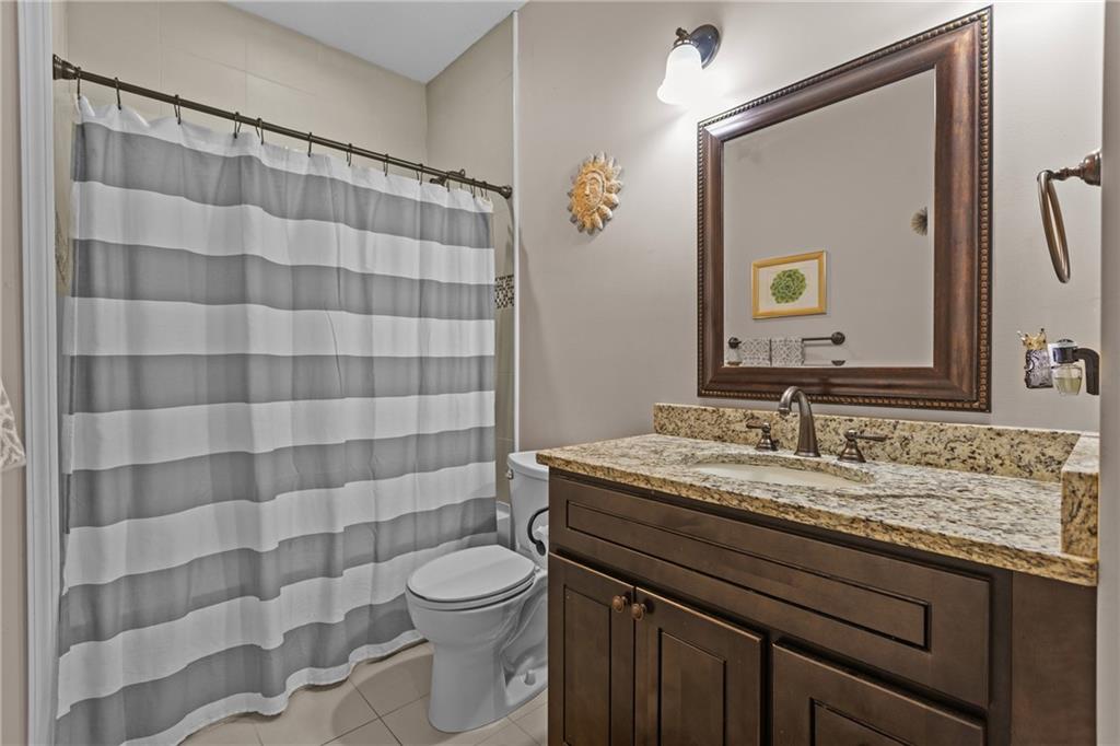 158 Hammond Road Mars, PA 16046 - Photo 16 of 49 a bathroom with a granite countertop sink a toilet and a mirror