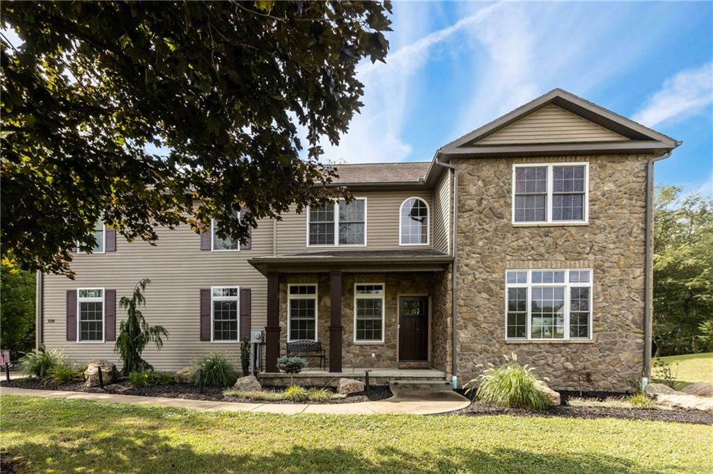 158 Hammond Road Mars, PA 16046 - Photo 2 of 49 a front view of a house with a yard outdoor seating and garage