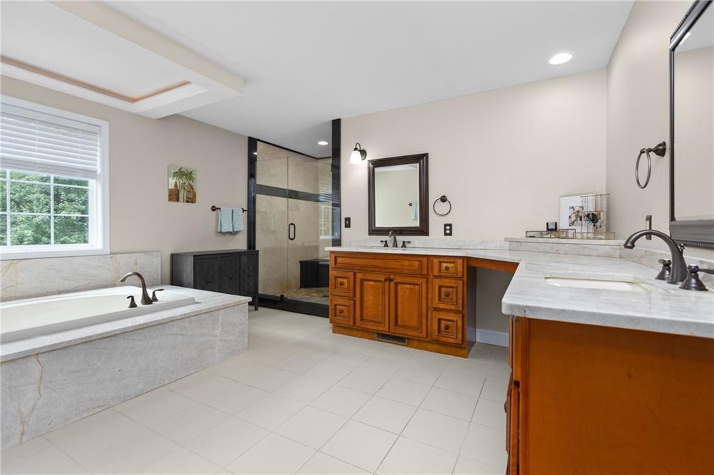 158 Hammond Road Mars, PA 16046 - Photo 22 of 49 a spacious bathroom with a tub sink and mirror