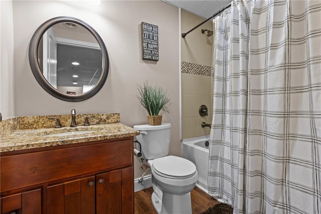 158 Hammond Road Mars, PA 16046 - Photo 30 of 49 a bathroom with a granite countertop sink a toilet and a mirror