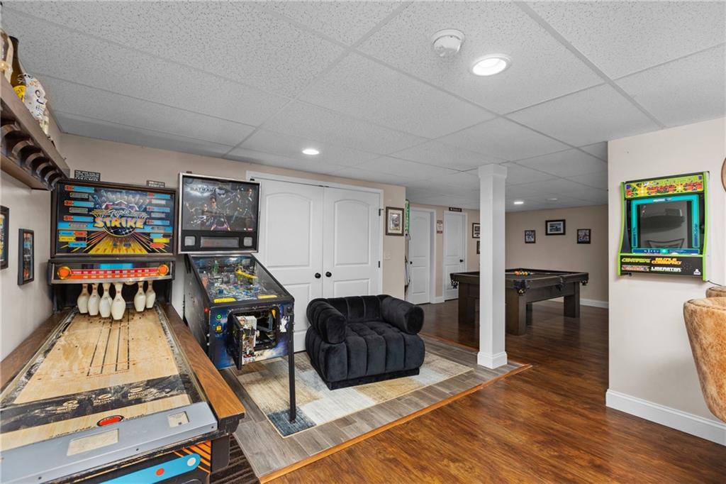 158 Hammond Road Mars, PA 16046 - Photo 33 of 49 a living room with furniture gym equipment and a flat screen tv