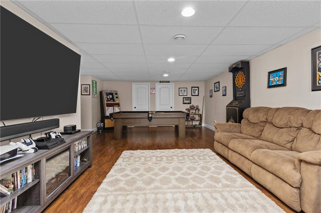 158 Hammond Road Mars, PA 16046 - Photo 36 of 49 a living room with furniture and a flat screen tv