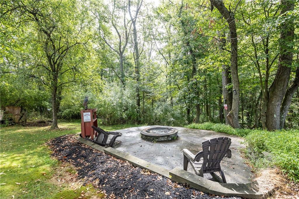 158 Hammond Road Mars, PA 16046 - Photo 41 of 49 a view of a backyard with table and chairs