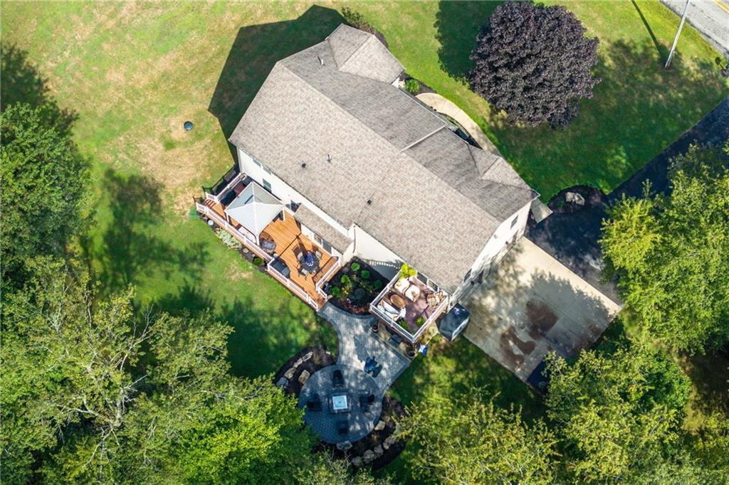 158 Hammond Road Mars, PA 16046 - Photo 45 of 49 an aerial view of a house with a yard and garden