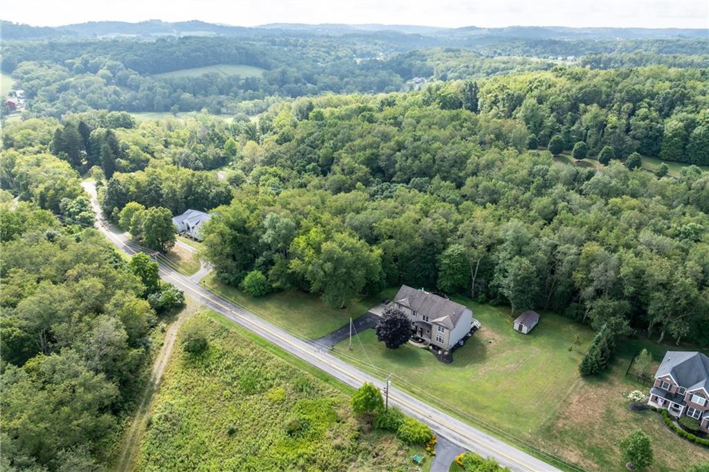 158 Hammond Road Mars, PA 16046 - Photo 48 of 49 a backyard of a house with a yard and outdoor seating