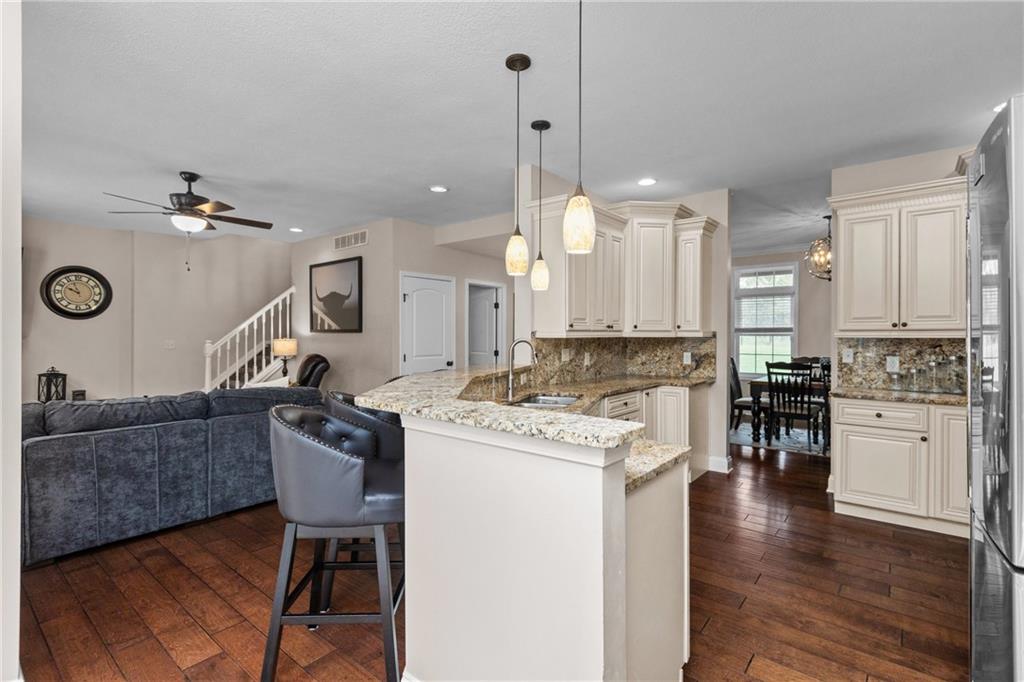 158 Hammond Road Mars, PA 16046 - Photo 7 of 49 a kitchen with a stove a refrigerator and a coffee table