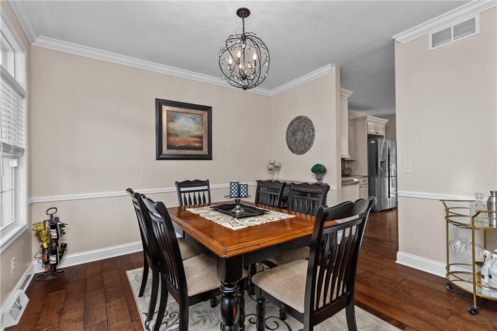 158 Hammond Road Mars, PA 16046 - Photo 10 of 49 a view of a dining room with furniture and wooden floor