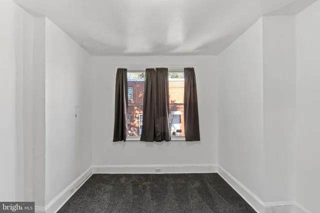 wooden floor and window in a room