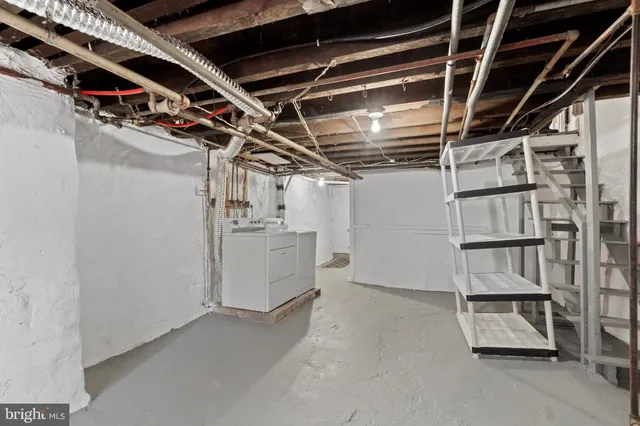 a utility room with cabinets