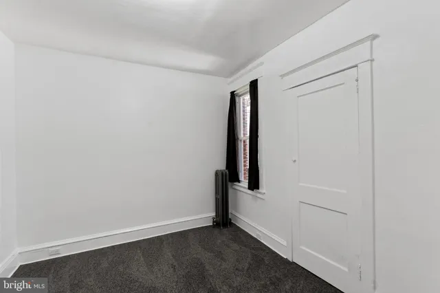 an empty room with a door