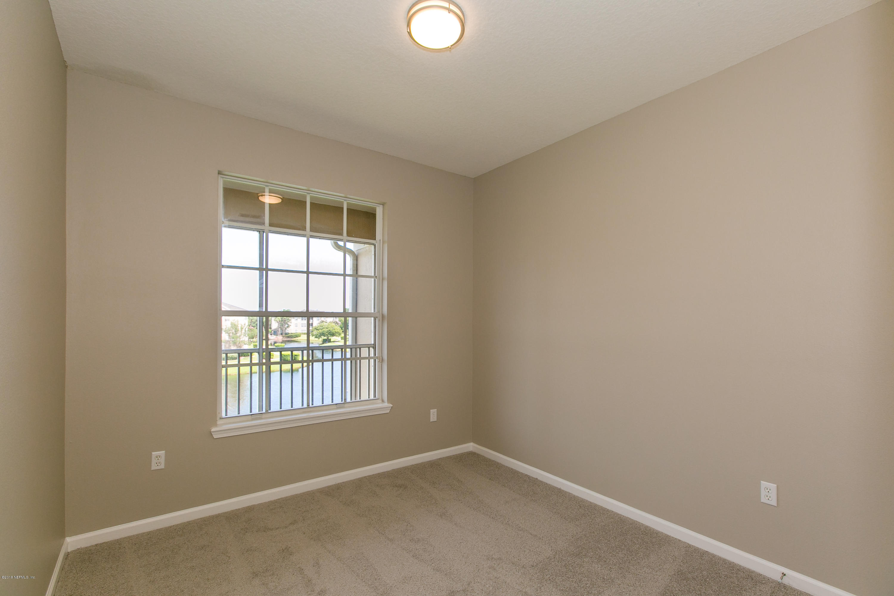7990 Baymeadows Road, Unit 714 Jacksonville, FL 32256 - Photo 16 of 38 Bedroom 2