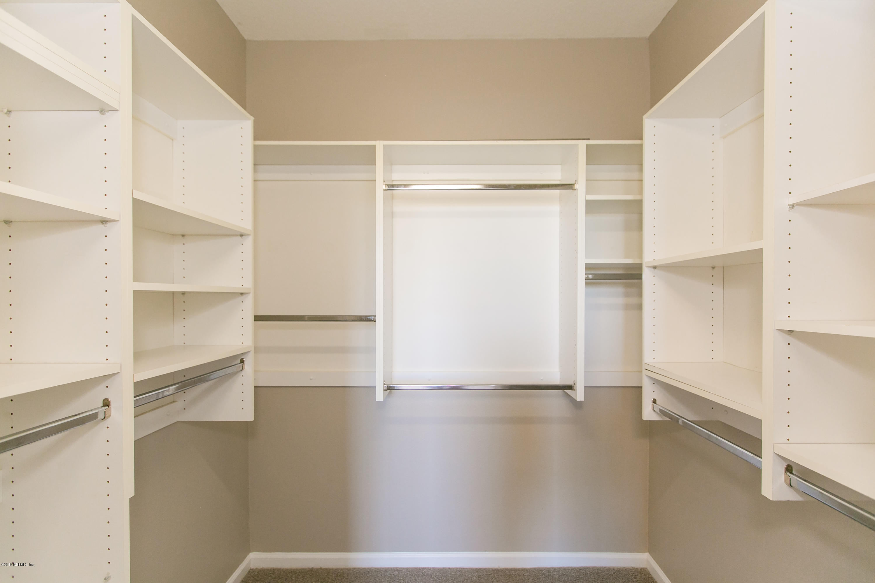 7990 Baymeadows Road, Unit 714 Jacksonville, FL 32256 - Photo 21 of 38 Organized Master Closet